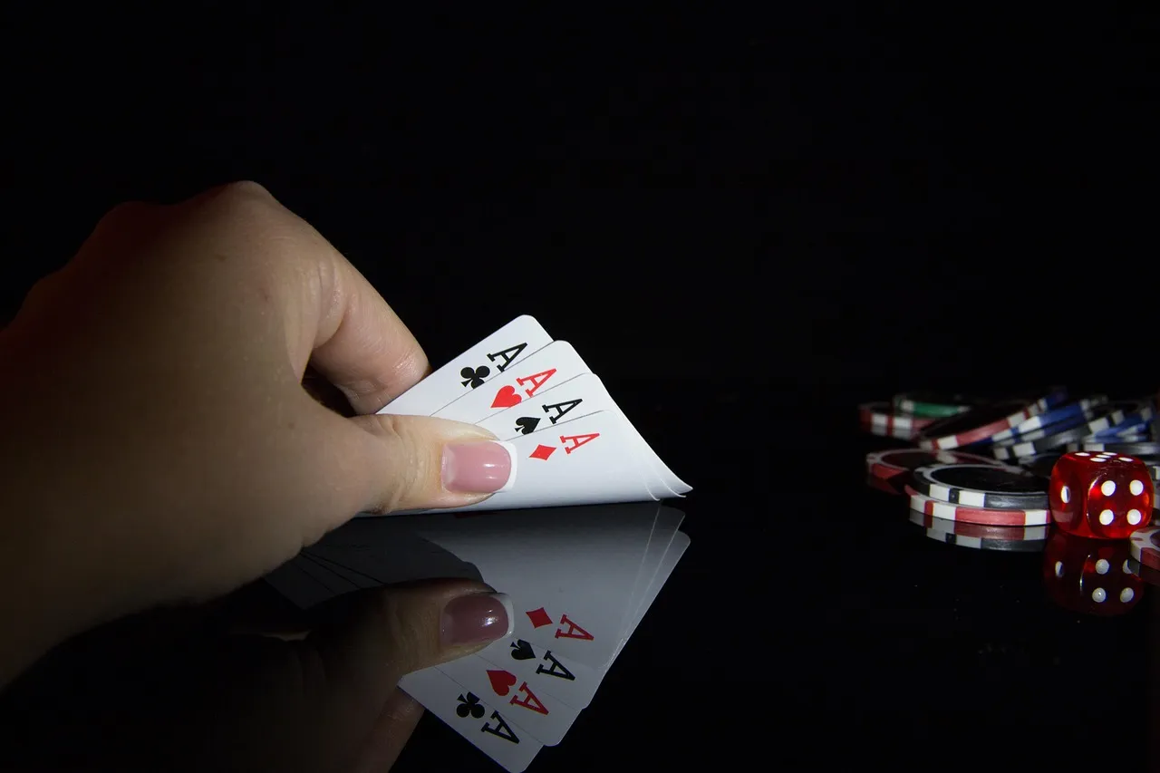 Royal flush poker hand on green background